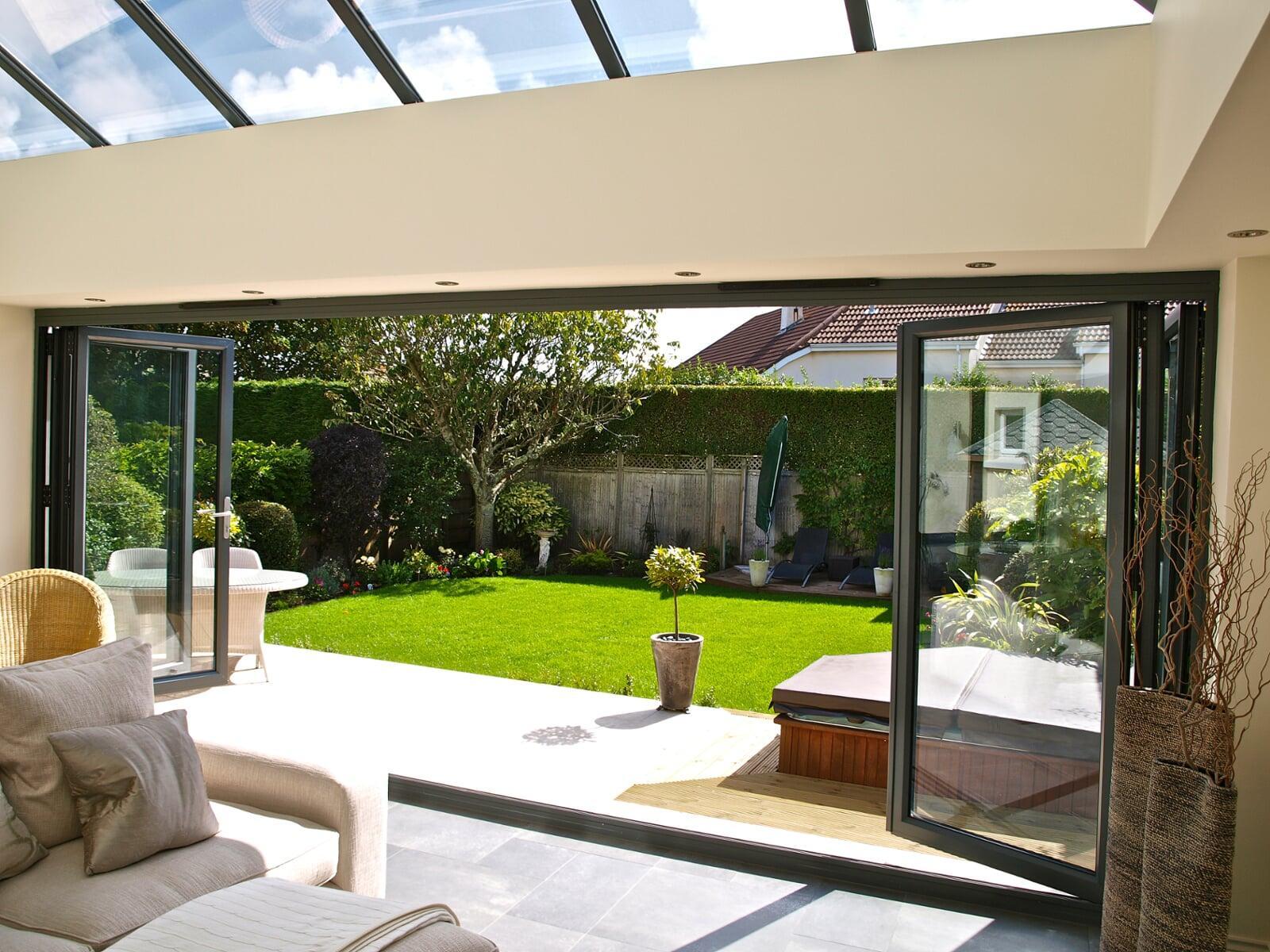 Bifold doors opening to create a seamless transition between the living area and garden